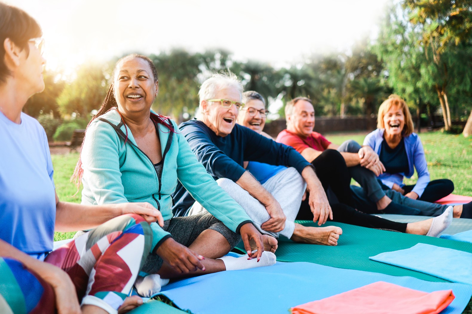 Happy senior people after yoga sport class