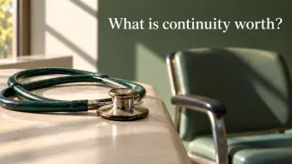 A well-used stethoscope rests beside a green patient chair beneath the words “What is continuity worth?”