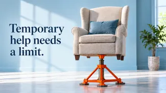 An orange temporary support holds an armchair beside the words “Temporary help needs a limit.”