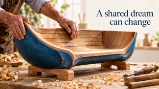 Older hands shape a blue canoe into a wooden bench beneath the words “A shared dream can change.”
