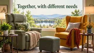 A supportive recliner and an upright armchair share a bright sitting room beneath the words “Together, with different needs.”