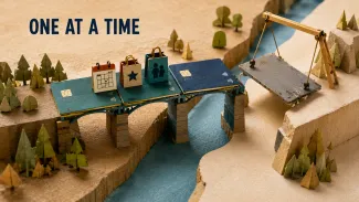 A miniature bridge retains three credit-card spans carrying payment, reward, and family-access symbols while a crane removes one unused span.