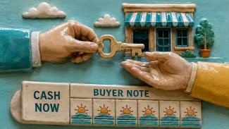 Ceramic hands exchange a business key above segments labeled Cash Now and Buyer Note.