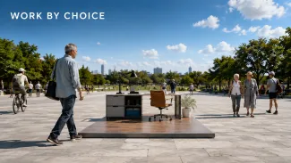 An older man approaches a small office platform within a large, active public park, illustrating part-time work as one bounded part of retirement.