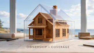 A wooden model home sits precisely inside a transparent protective structure, representing aligned ownership and insurance records.