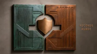 Interlocking teal and copper records surround a protective shield beside the words “Records Agree.”