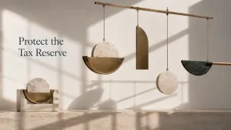 A balanced stone-and-brass mobile holds one segment securely beneath the words “Protect the Tax Reserve.”