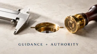 An unmarked precision instrument and brass authorization seal align around a central decision aperture.