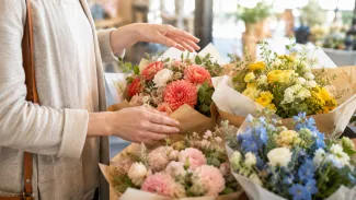 : A person choosing flowers suggests that a charitable gift should begin by naming the question the donor is trying to answer.