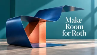 A folded blue metal sculpture rests on a copper brace beside the words Make Room for Roth.