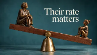 Bronze figures representing two generations sit on opposite ends of a wooden balance beneath the words “Their rate matters.”