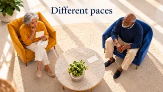 An older couple sits in yellow and blue chairs, with one reviewing a card beneath the words “Different paces.”