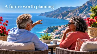 An older couple discusses future plans on a sunny coastal terrace beneath the words “A future worth planning.”