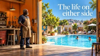 An older business owner pauses in his workshop beside a doorway opening onto a community pool beneath the words The life on either side.