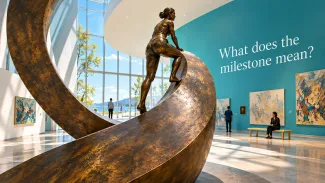 A bronze figure ascends a sweeping sculpture in a bright gallery beside the words “What does the milestone mean?”