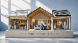 Three distinct roof systems protect a cutaway home where a retired couple sits together.