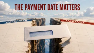 A final-pay envelope bridges a canyon between December and January calendar pages, showing how payment timing can determine the tax year.