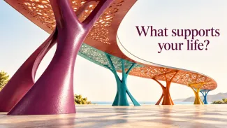 Colorful branching columns support a flowing canopy beneath the words “What supports your life?”